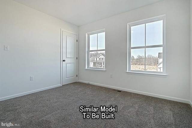 view of carpeted spare room