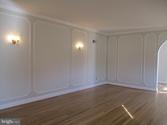 empty room featuring hardwood / wood-style flooring