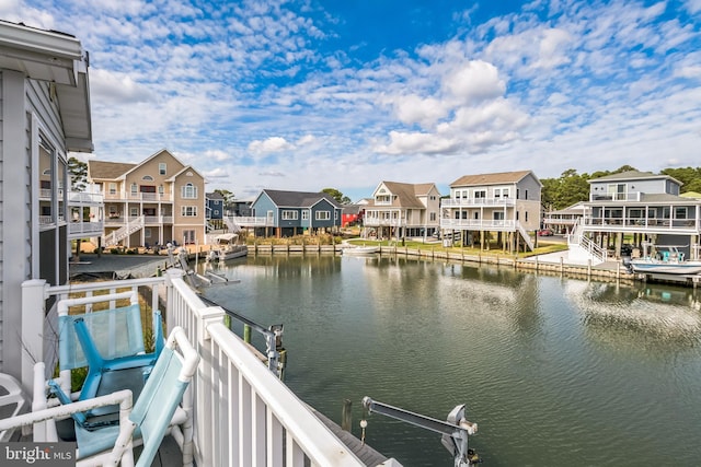 property view of water featuring a boat dock