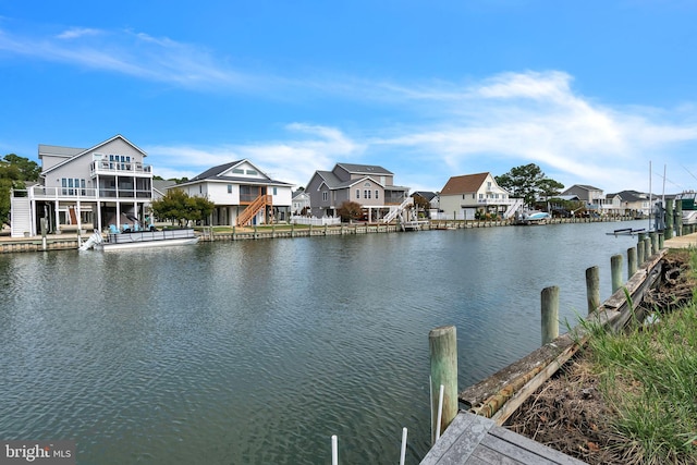 dock area with a water view