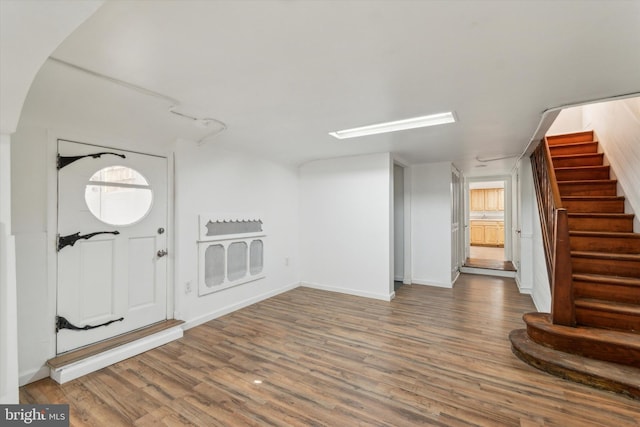 foyer with hardwood / wood-style floors