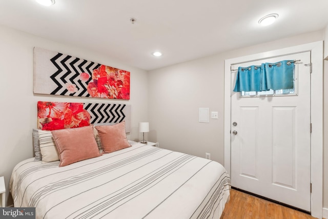 bedroom featuring light wood-type flooring