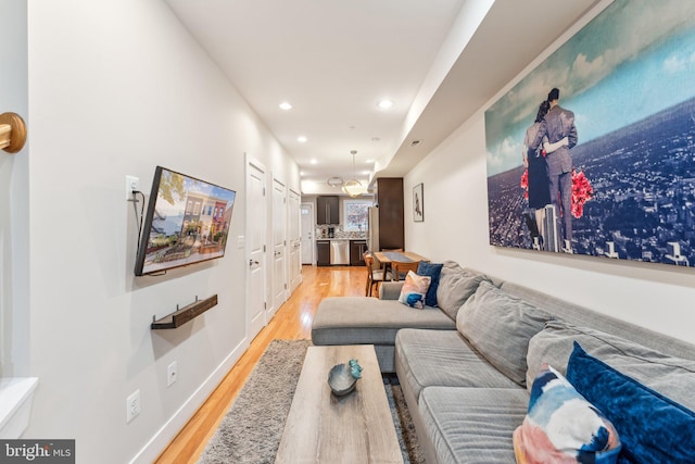 living room with light hardwood / wood-style floors