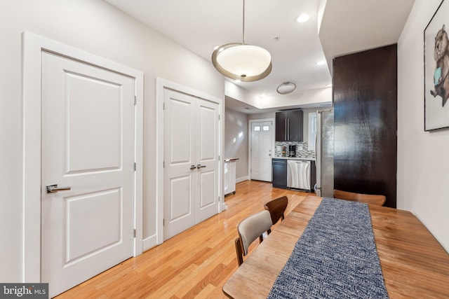 dining area with light hardwood / wood-style floors