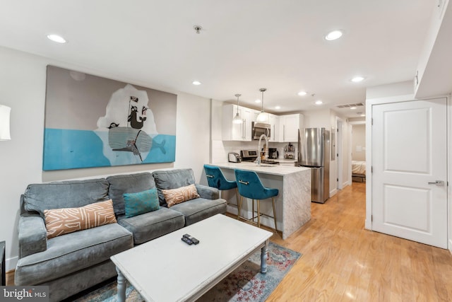 living room featuring light hardwood / wood-style flooring