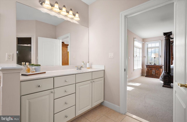 bathroom with vanity and tile patterned flooring