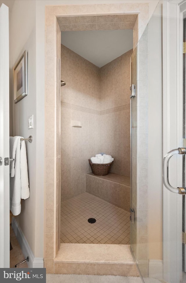 bathroom with an enclosed shower