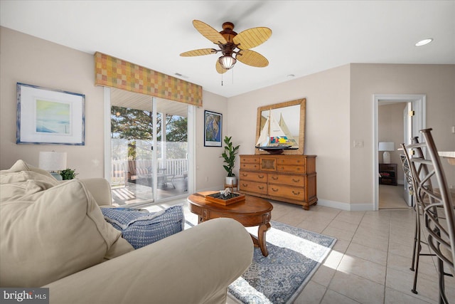 tiled living room with ceiling fan