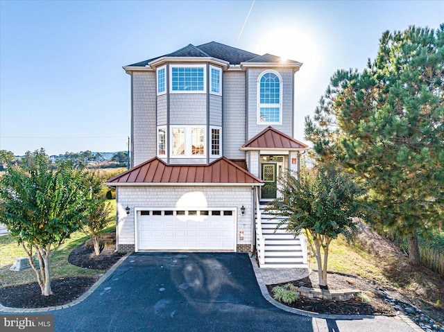 view of front of property featuring a garage