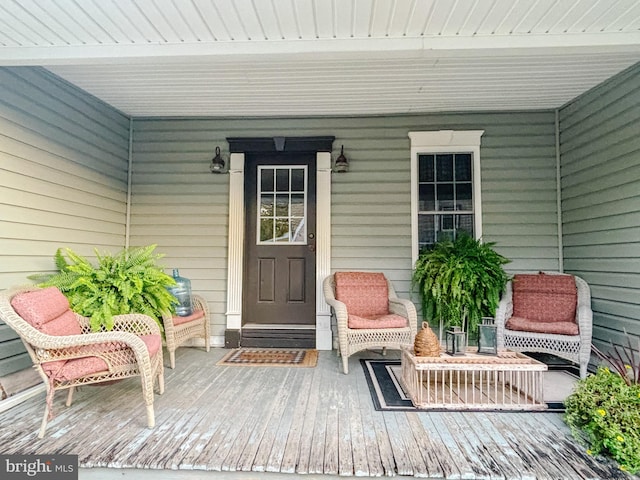 entrance to property with a porch