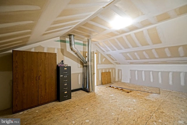 bonus room featuring lofted ceiling