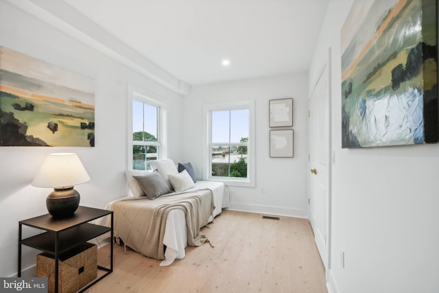 bedroom with light hardwood / wood-style flooring