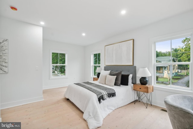 bedroom featuring light wood-type flooring