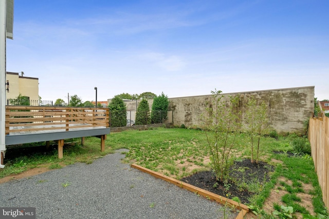 view of yard featuring a deck