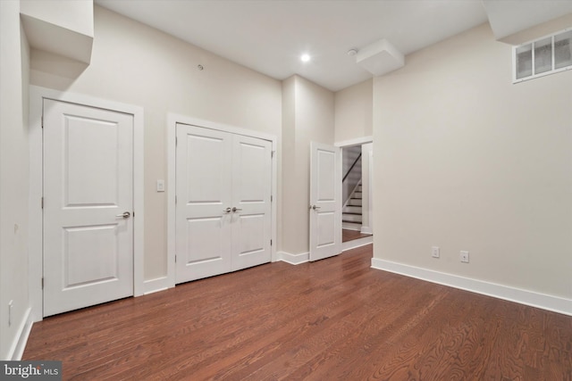 interior space featuring dark wood-type flooring