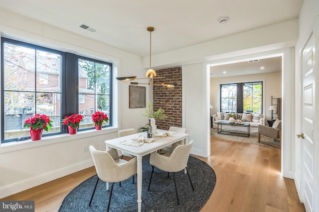 dining area featuring light hardwood / wood-style flooring