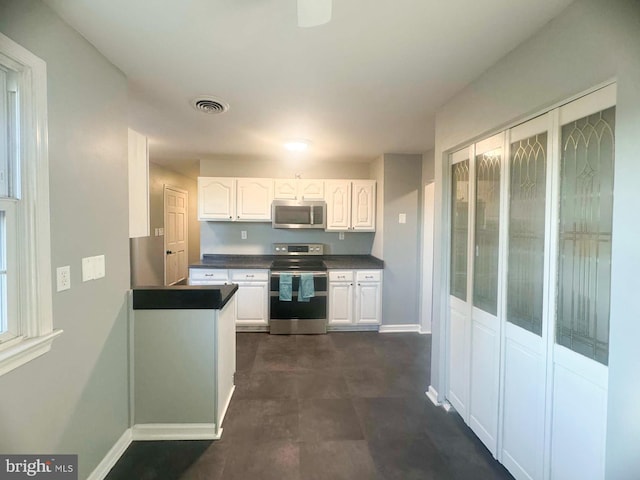 kitchen featuring white cabinets and stainless steel appliances