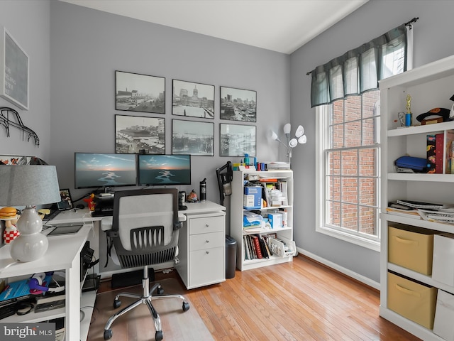 211 Glyndon Meadow Rd, Reisterstown, MD 21136 - home office featuring hardwood / wood-style floors, plenty of natural light, and baseboards