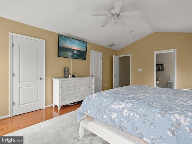 211 Glyndon Meadow Rd, Reisterstown, MD 21136 - bedroom featuring lofted ceiling, wood finished floors, ceiling fan, and ensuite bathroom