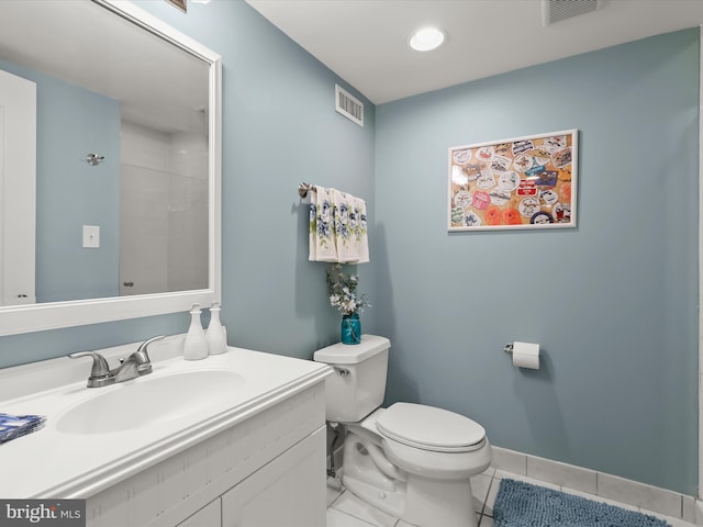 211 Glyndon Meadow Rd, Reisterstown, MD 21136 - bathroom with tile patterned floors, toilet, vanity, and baseboards