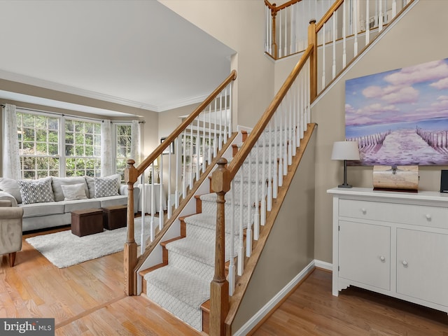 211 Glyndon Meadow Rd, Reisterstown, MD 21136 - staircase with crown molding, wood finished floors, and baseboards