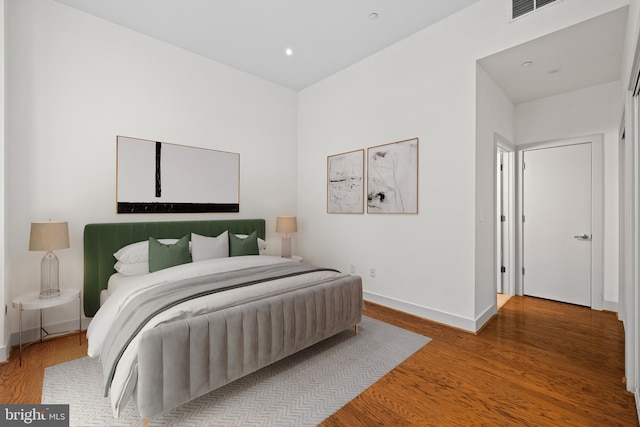 bedroom featuring hardwood / wood-style floors