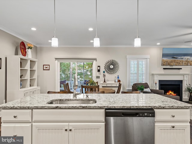 kitchen featuring stainless steel dishwasher, decorative light fixtures, and white cabinetry