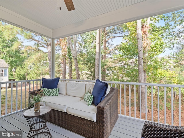 sunroom / solarium with ceiling fan