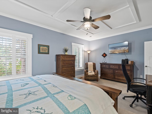 carpeted bedroom with ceiling fan and crown molding