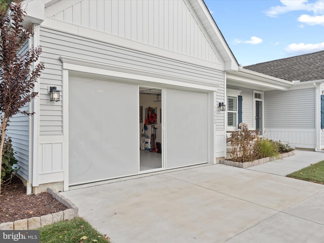 view of property exterior with a garage