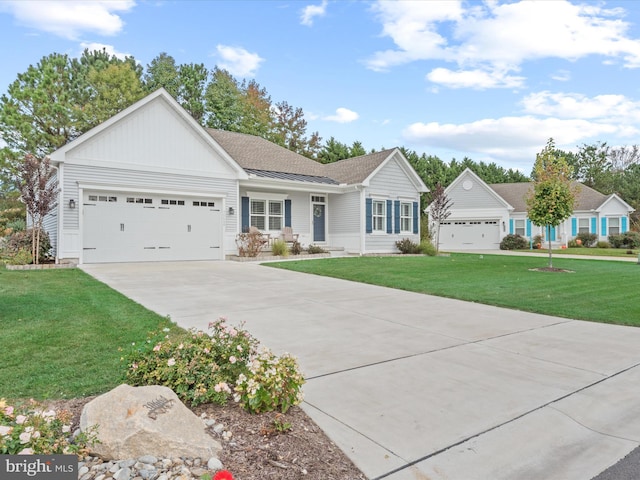 single story home with a garage and a front lawn