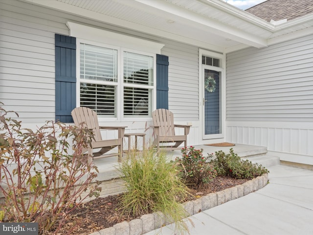 entrance to property with covered porch