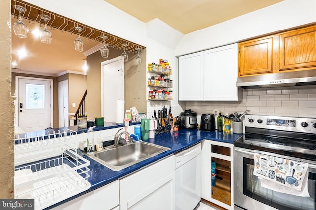 kitchen featuring electric range, backsplash, white dishwasher, a sink, and under cabinet range hood