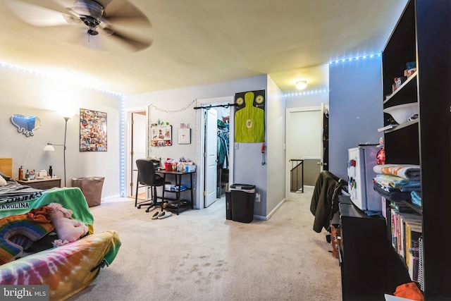 playroom featuring carpet and a ceiling fan