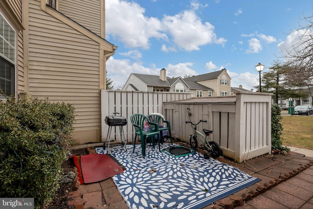 view of patio / terrace with fence