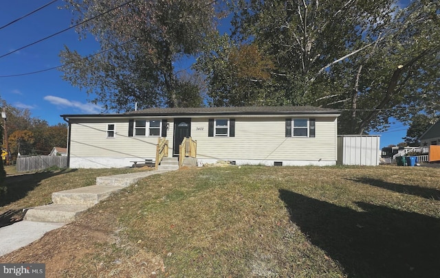 manufactured / mobile home with a front yard