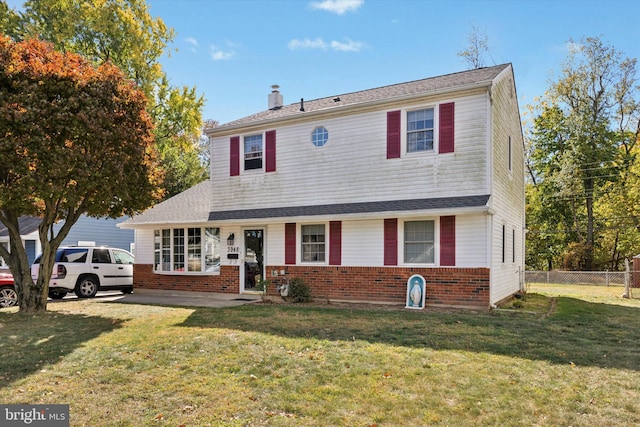 view of front of home with a front lawn