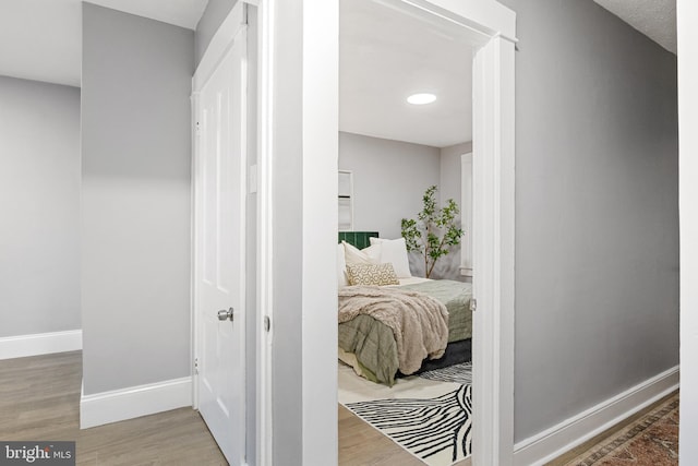 bedroom with light wood-type flooring