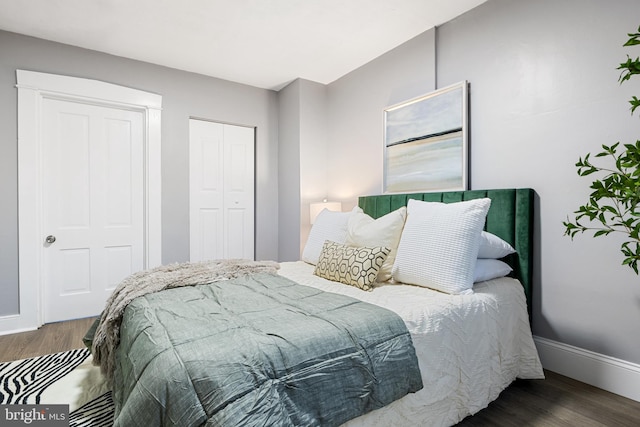 bedroom featuring dark hardwood / wood-style floors