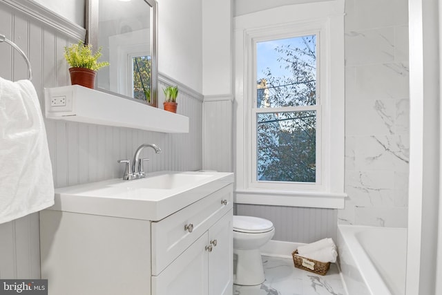 full bathroom with vanity, toilet, and shower with separate bathtub