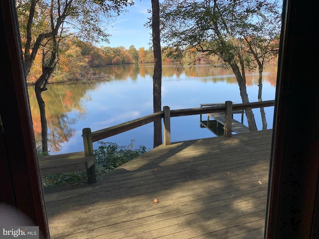 dock area featuring a water view