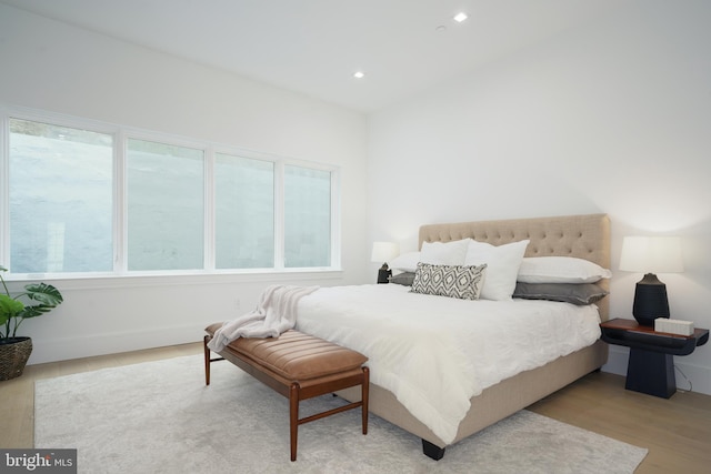 bedroom with light hardwood / wood-style flooring