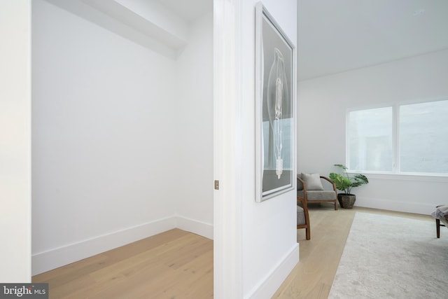 hall with light wood-type flooring