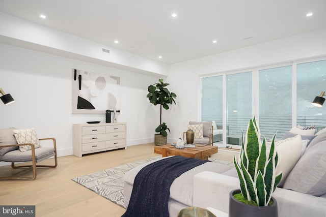 bedroom with light hardwood / wood-style flooring