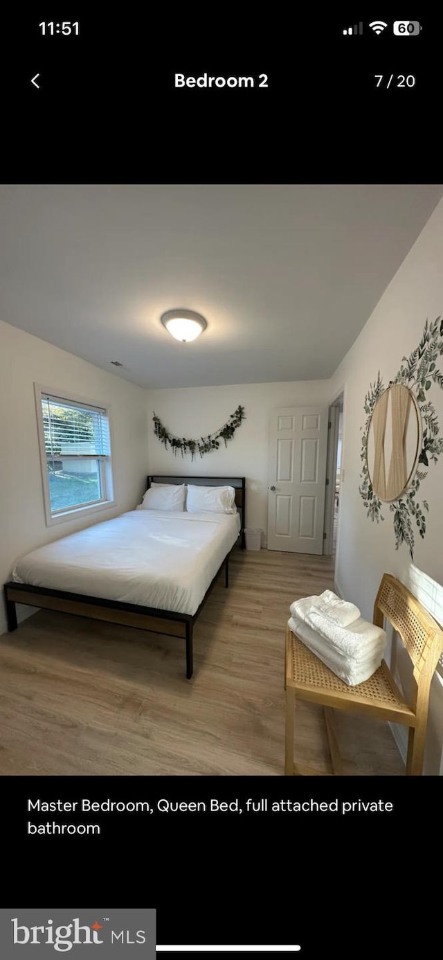 bedroom featuring hardwood / wood-style flooring