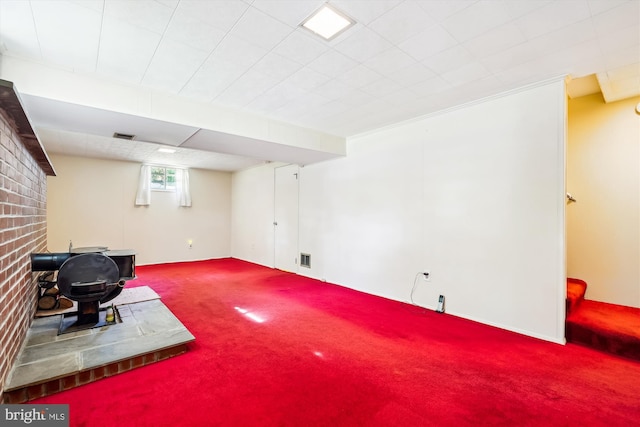 basement with carpet flooring