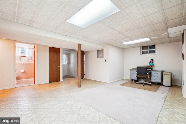 office space featuring a paneled ceiling