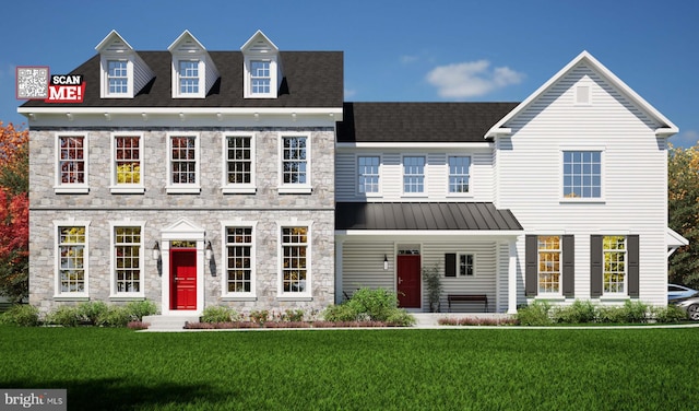 view of front of home featuring a front lawn, a standing seam roof, stone siding, metal roof, and a shingled roof