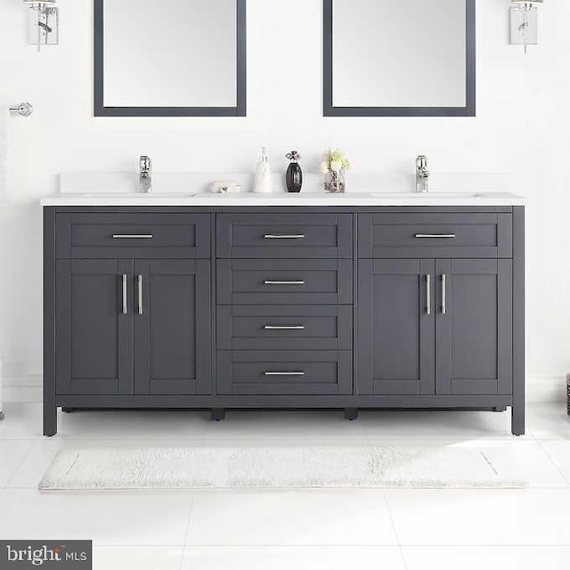 bathroom featuring tile patterned floors and vanity