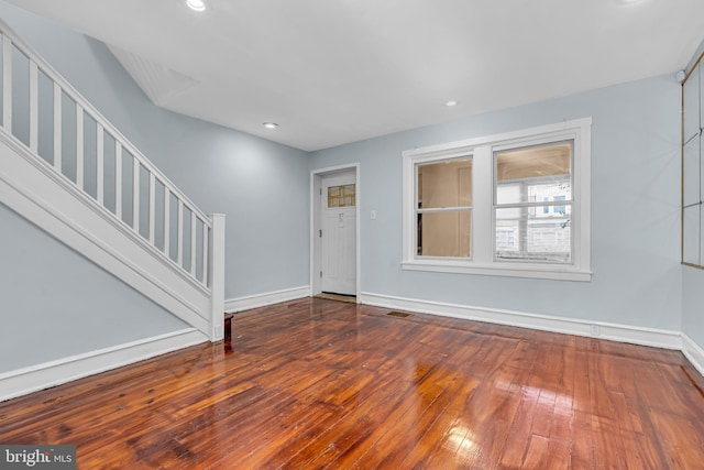 entrance foyer featuring wood-type flooring